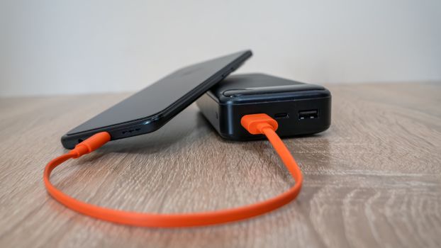 charging cable power bank - Photo by Eleonora Vokueva (Pexels)